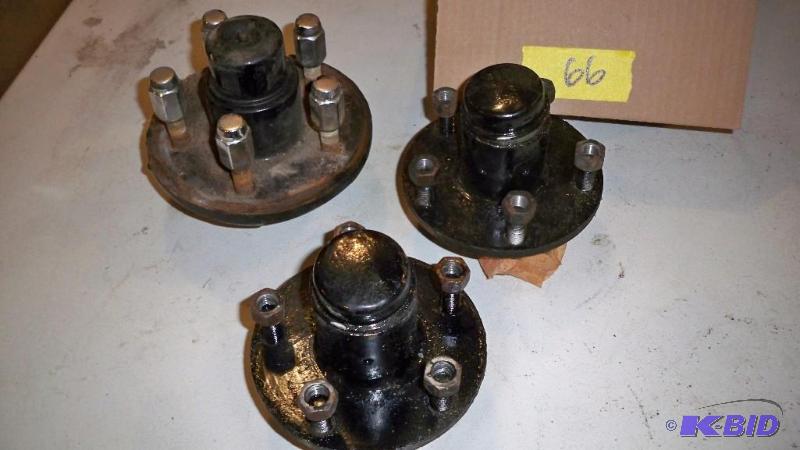 3 USED TRAILER AXLE HUBS...