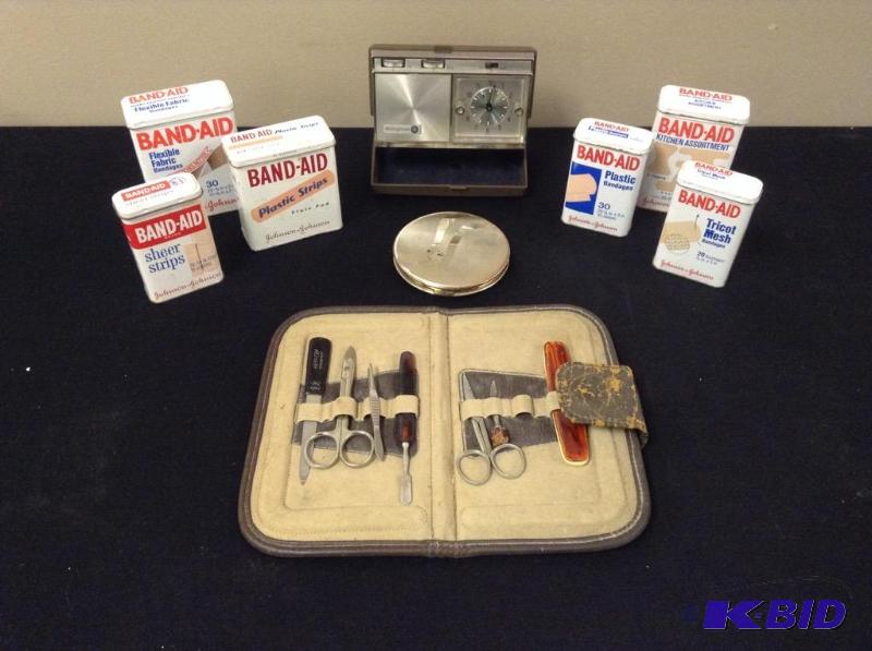 lot 71 image: Vintage Band-Aid Tins, GE Alarm Clock & More