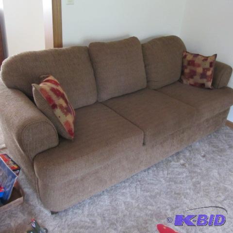 lot 10 image: Three Cushion Sofa