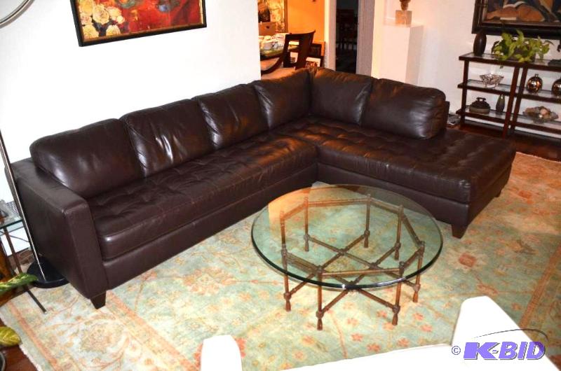 lot 1 image: Murano Leather sectional couch purchased fro...