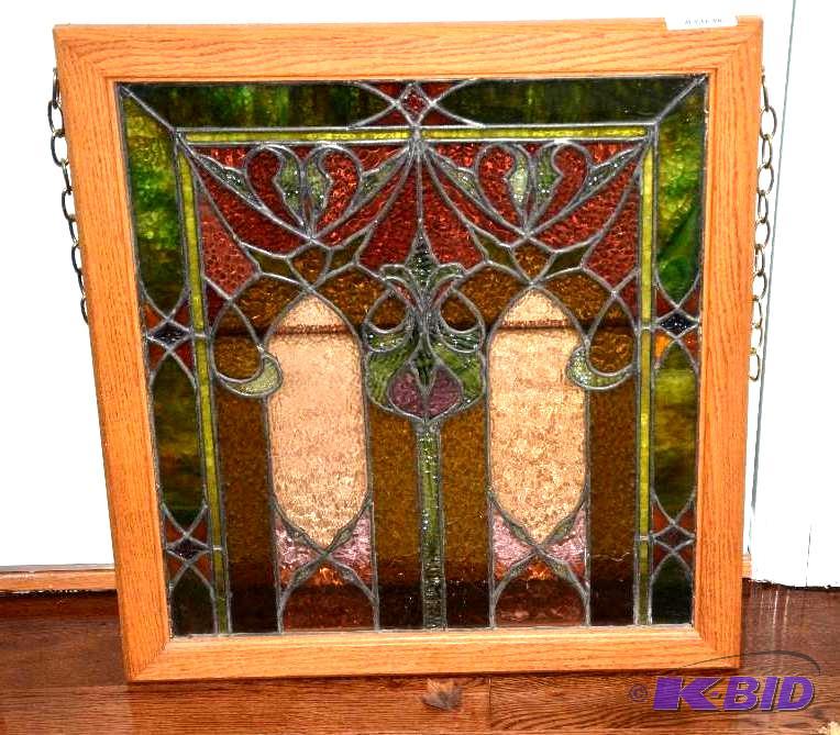 lot 12 image: Beautiful stained glass in wood frame 27x29&q...