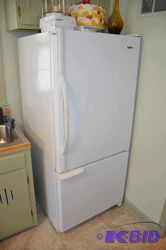 lot 6 image: Kenmore refrigerator model 596.65932404. It i...
