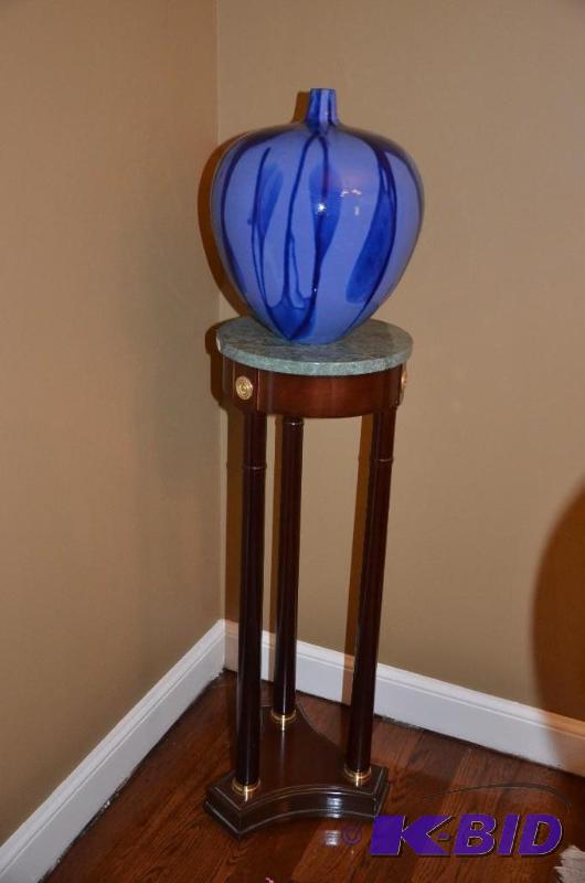 lot 7 image: Blue glass jar 12x15". table is not incl...