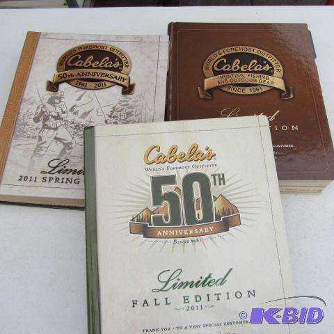 lot 247 image: Cabelas Hard Cover Catalogs