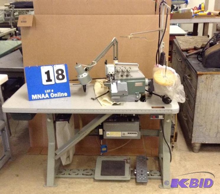 lot 18 image: Pegasus E51-130 Serger with Table