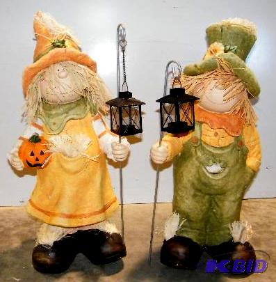 lot 68 image: Girl and Boy Scarecrow - Both are 26" h ...