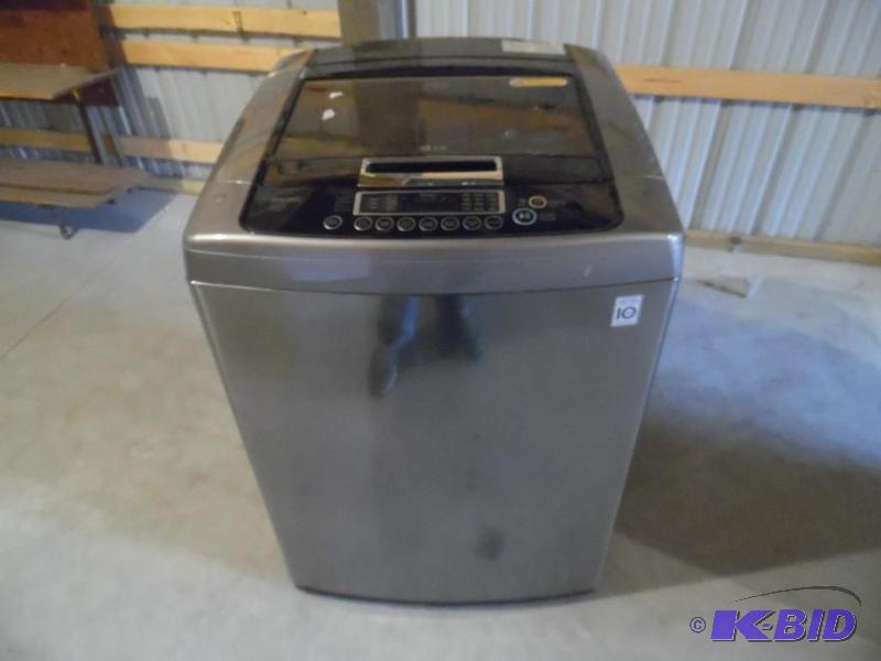 lot 2 image: NEW LG 4.3 cu. ft. High-Efficiency Front Control Top Load Washer in Graphite Steel