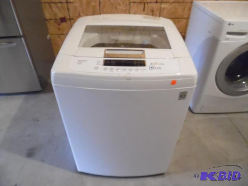 lot 3 image: NEW LG 4.1 cu. ft. High-Efficiency Front Control Top Load Washer in White