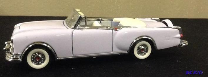 lot 51 image: 1953 Packard Caribbean Convertible 143 Scale by The Franklin Mint