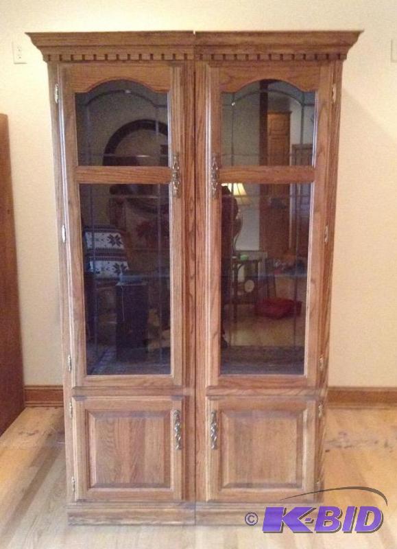 lot 15 image: Two Glass Front Oak Cabinet