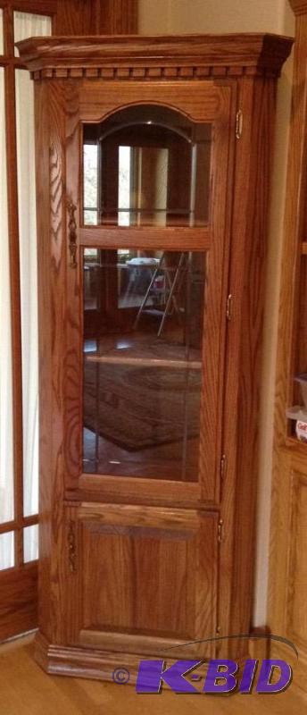 lot 16 image: Glass Front Oak Corner Cabinet