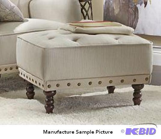 Ottoman - Is upholstered in off-white with gr...