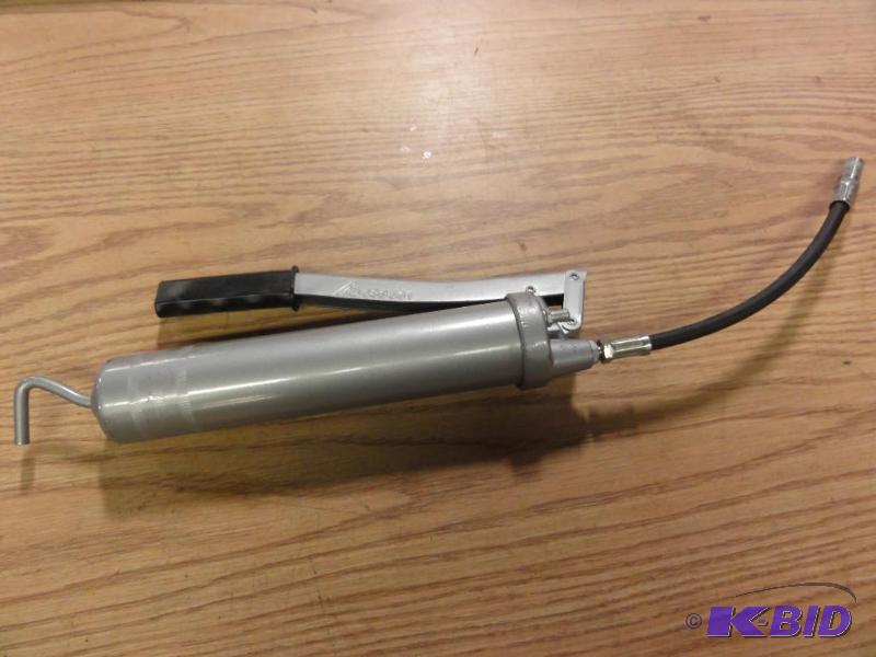 lot 137 image: Manual Grease Gun...