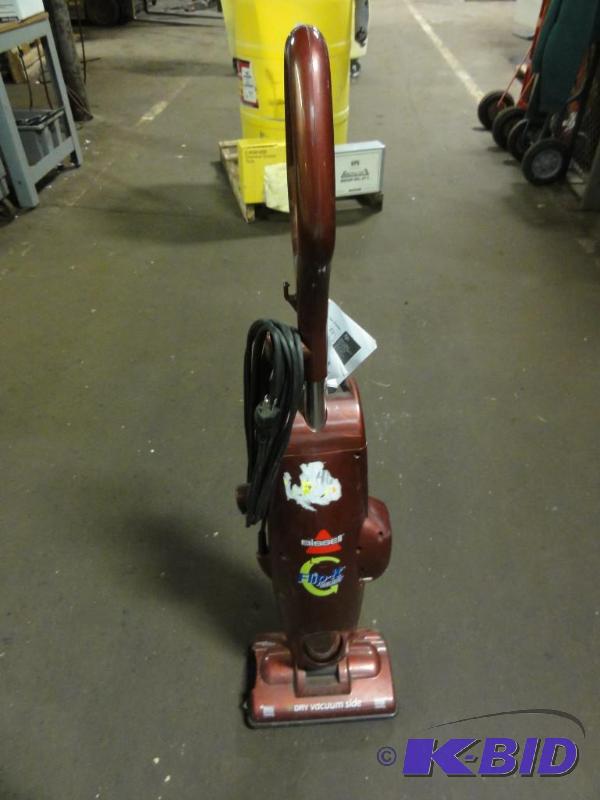 lot 320 image: Bissell Flip-It Select Wet Dry Upright Vacuum...