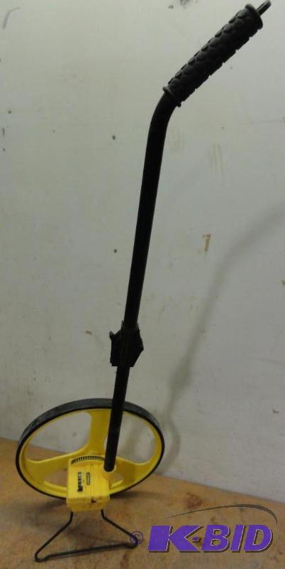 lot 42 image: Stanley 9,999 Foot Metal Wheel Tape Measure w...