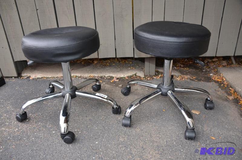 lot 11 image: two stools on wheels adjustable height 18-26...