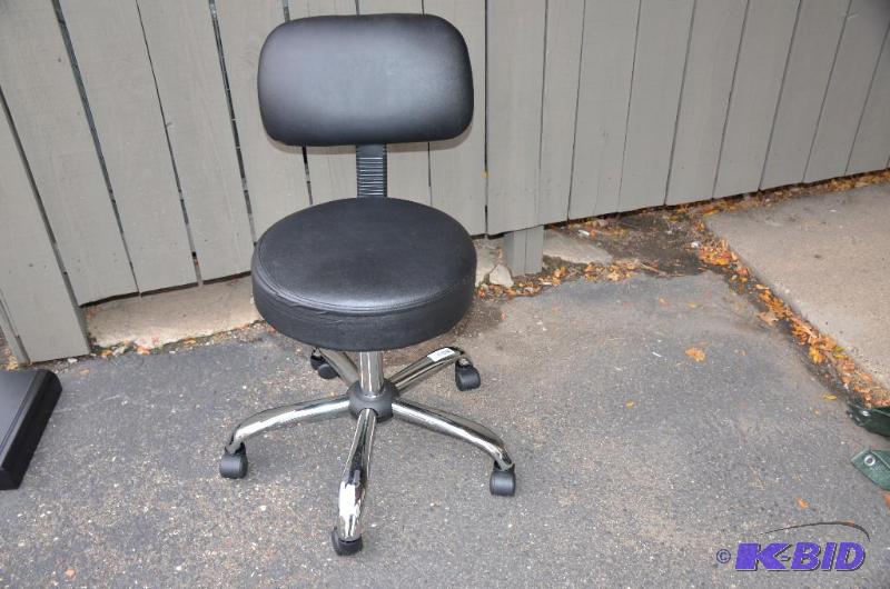 lot 13 image: 1 chair with back on wheels and adjustable he...