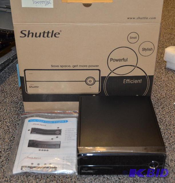 lot 130 image: New in box Shuttle XG41 with RAM, no HD...