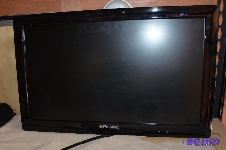 lot 21 image: Polaroid HD LCD TV DVD Combo. Powers up It ma...