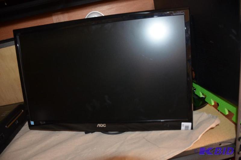 lot 23 image: AOC LCD monitor with wall mount. Powers up...