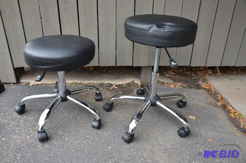 lot 8 image: two stools on wheels, adjustable height betwe...