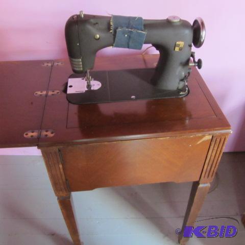 lot 227 image: MW Cabinet Sewing Machine