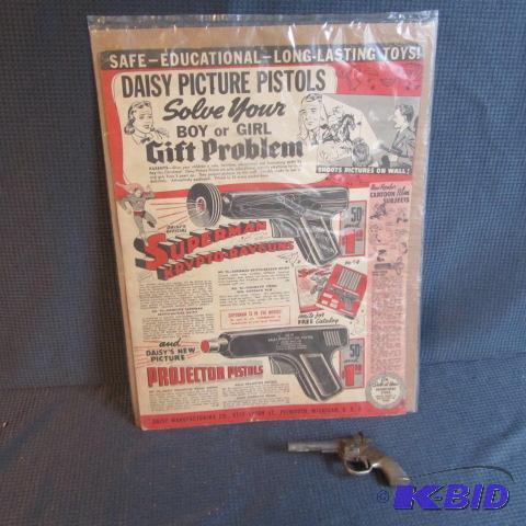 lot 310 image: Daisy Cap Pistol & Ad