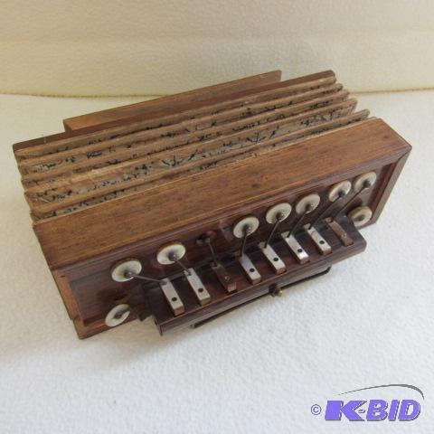 lot 82 image: Musical Squeeze Box