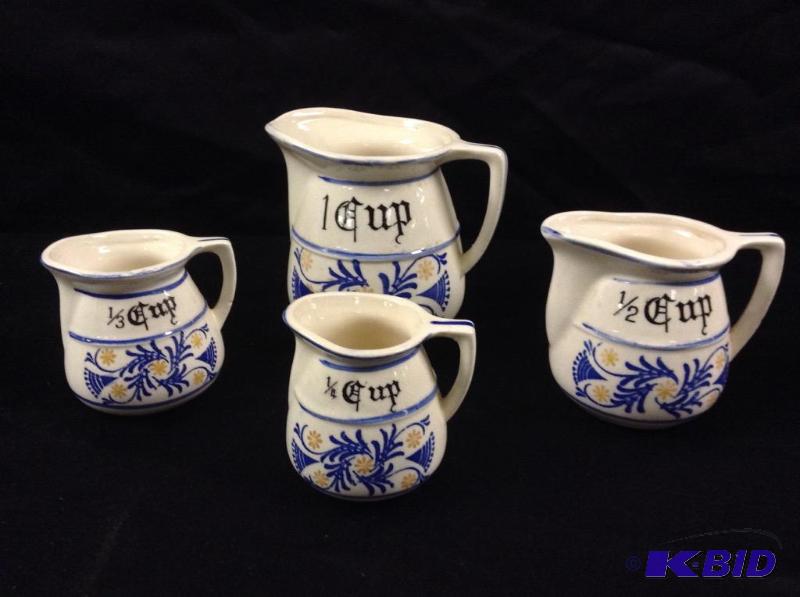 lot 128 image: Cute Pitcher Measuring Cups