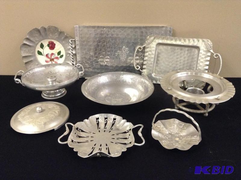 lot 60 image: Pewter and Tin Serving Pieces