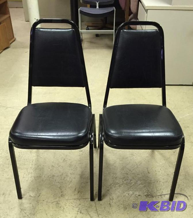 Two Black Vinyl Upholstered Stacking Chairs