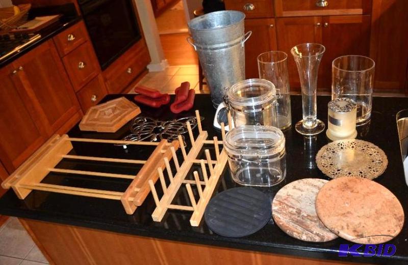 lot 110 image: Kitchen ware- two stone hot pads, glass canis...