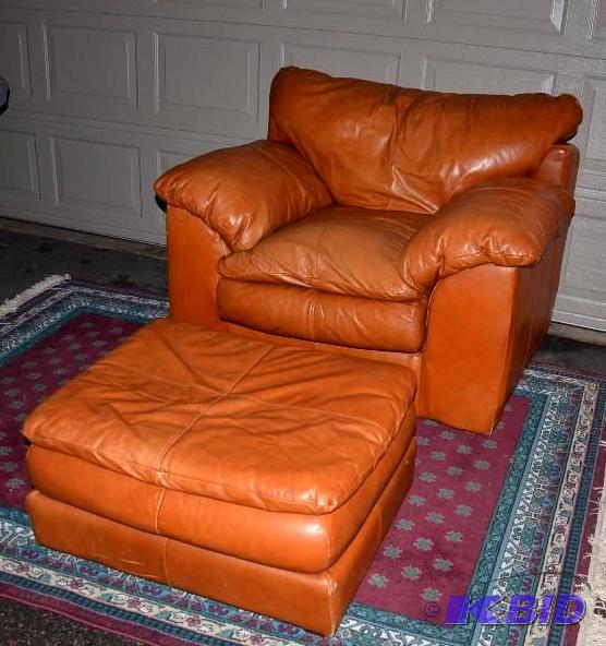 lot 14 image: This Soft Leather oversized down chair with l...