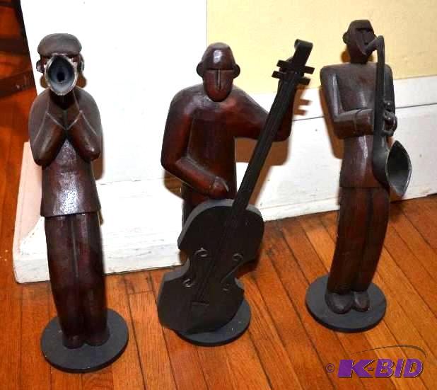 lot 106 image: Set of three wood carved musicians 18" t...