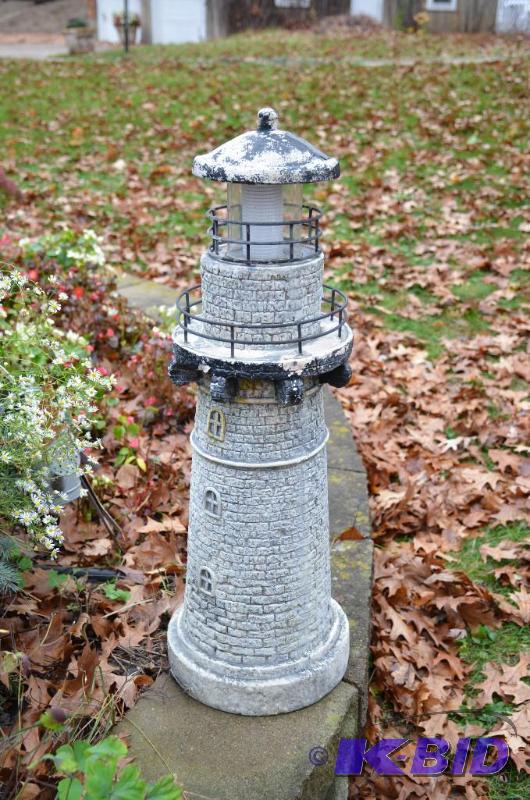 lot 129 image: Lighted light house 31" tall...
