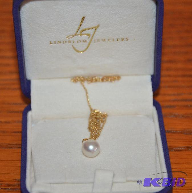 lot 14 image: Genuine large Pearl Necklace stamped K18, we ...