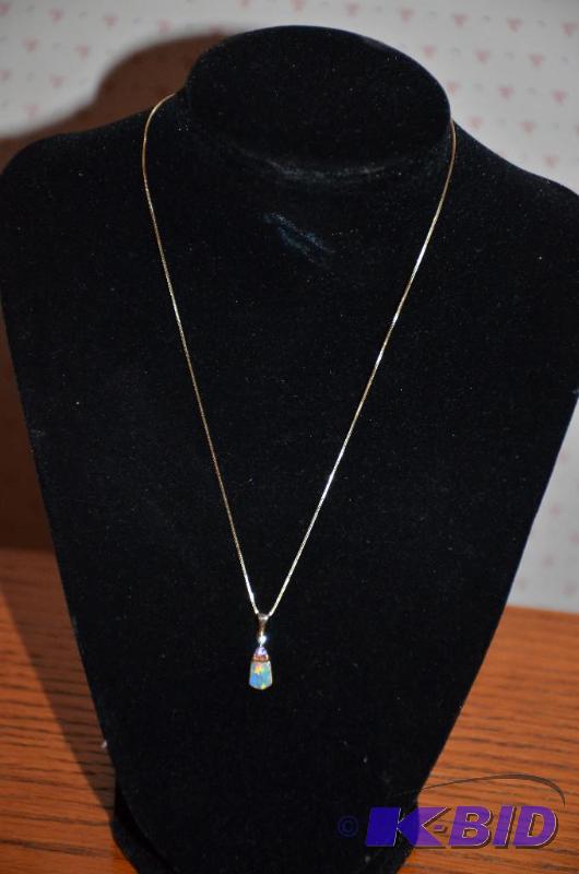 lot 15 image: 14k Gold necklace chain and 14k gold plated p...