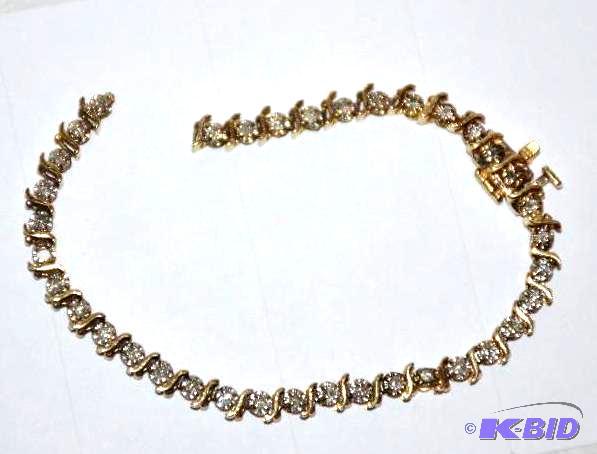 lot 18A image: 14k Gold diamond tennis bracelet (broken)...