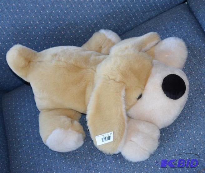 lot 53 image: FA Schwarz Stuffed dog 22" long...