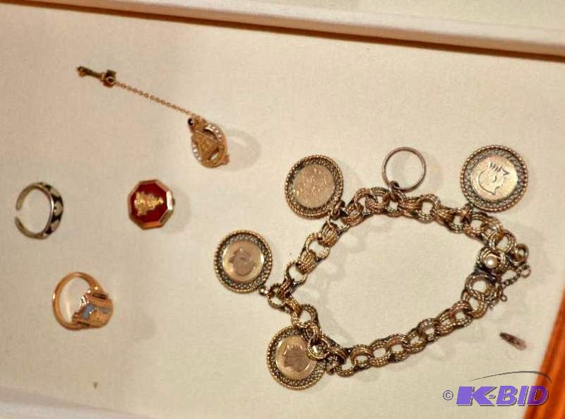 lot 6A image: 14k Gold plated charm bracelet,  silver ring...