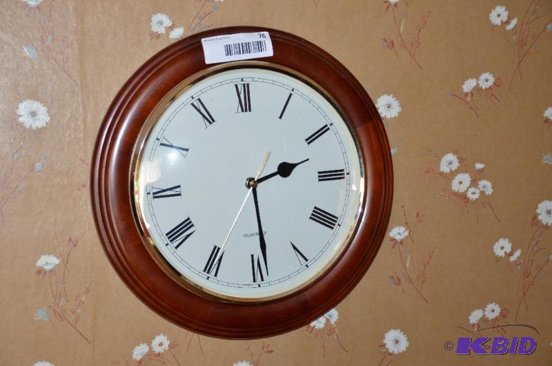 lot 76 image: clock 12" diameter...