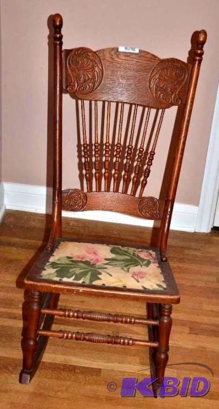 lot 8 image: Antique rocking chair 40 tall , cloth seat v...