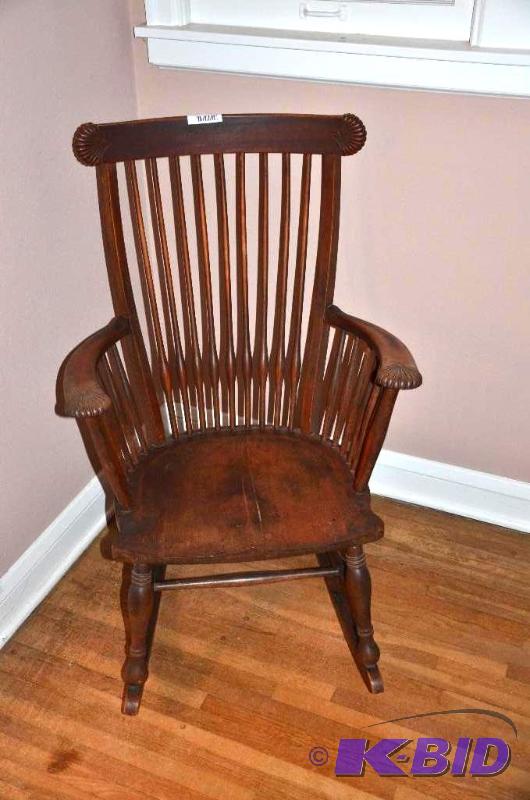lot 9 image: Antique rocking chair with carved shells on ...