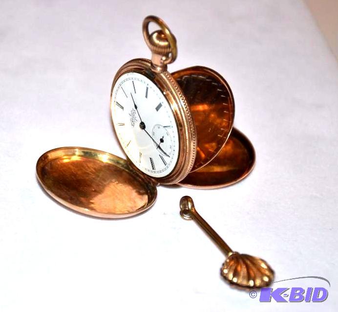 lot 26A image: 14k-18k Gold Pocket watch with shell fob, Don...