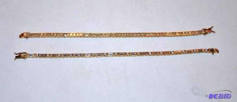 lot 27 image: 2 14k Gold Bracelets...