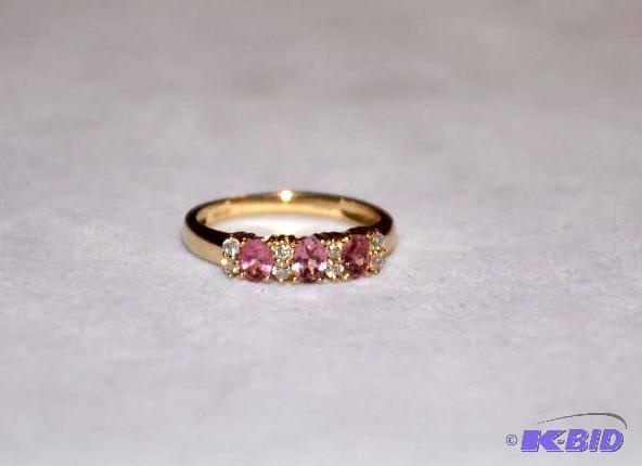 lot 29 image: 14k Gold Ring with Diamonds and pink stones...