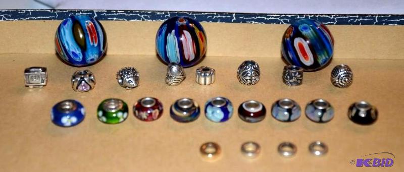 lot 30 image: 14k Gold, Sterling Silver and glass Pandora ...