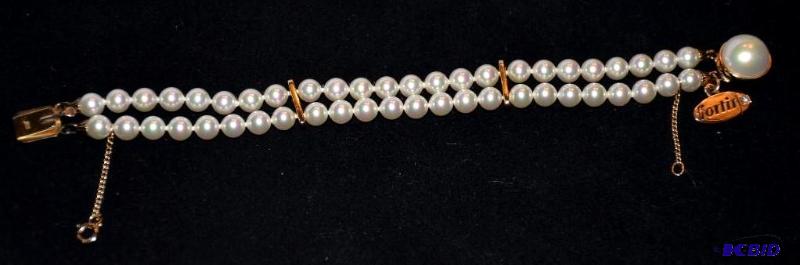 lot 48 image: 14k Gold EMB bracelet....