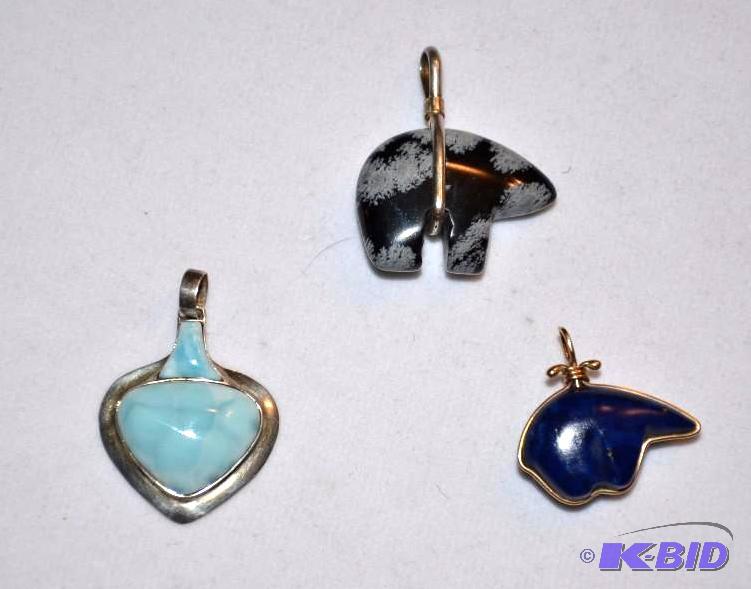 lot 50 image: 3 Gold & Silver Pendandts with stones...