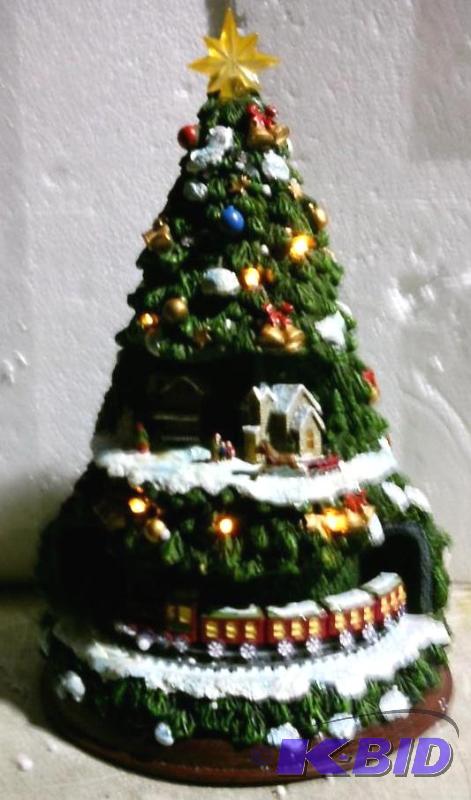 lot 109 image: Musical Lighted Tree with Train - Train goes ...